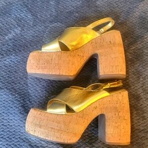 SCHUTZ gold platforms